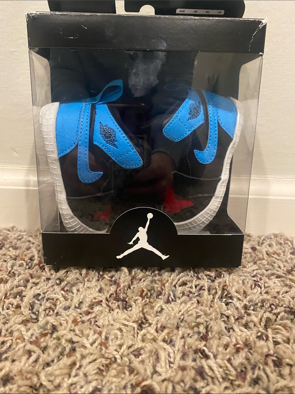 Nike Jordan 1 Crib Bootie in Black and Powder Blue